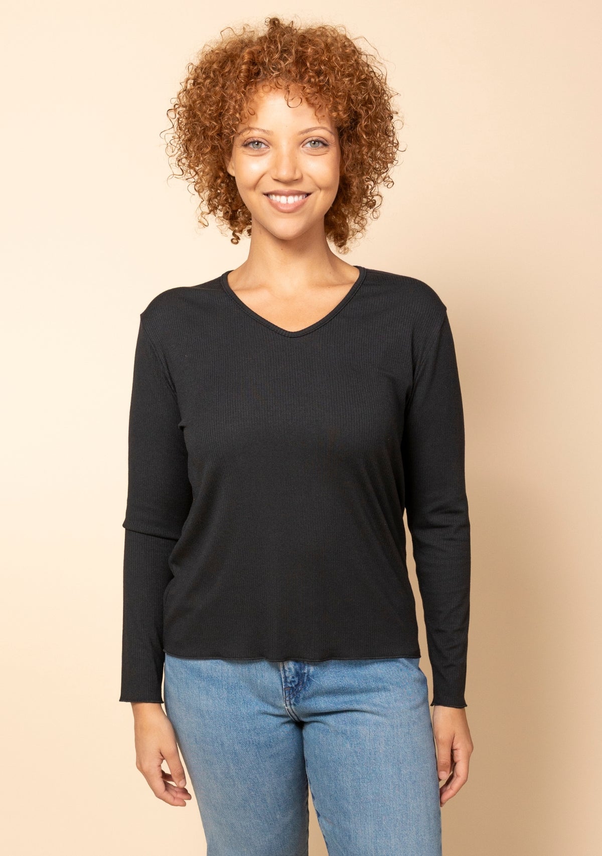 Hedy Modal Ribbed V Neck Long Sleeve Tee in Black, front view.