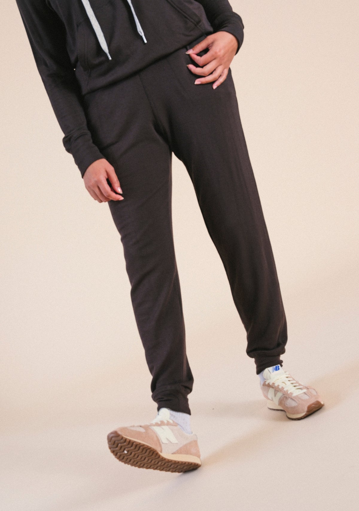 Classic Cuffed Women's Joggers in dark brown. Drawstring and side slit pockets. Made in sizes XS-3X