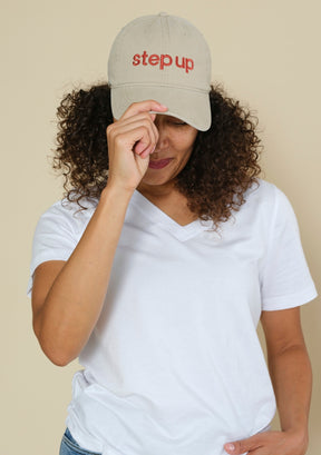 Cream Step Up baseball cap with embroidered front logo color cinnamon, curved brim and relaxed dad hat silhouette