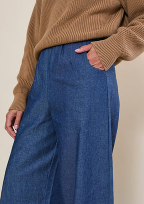 Close-up of side-slit pockets on Poplinen blue deadstock denim wide leg pants