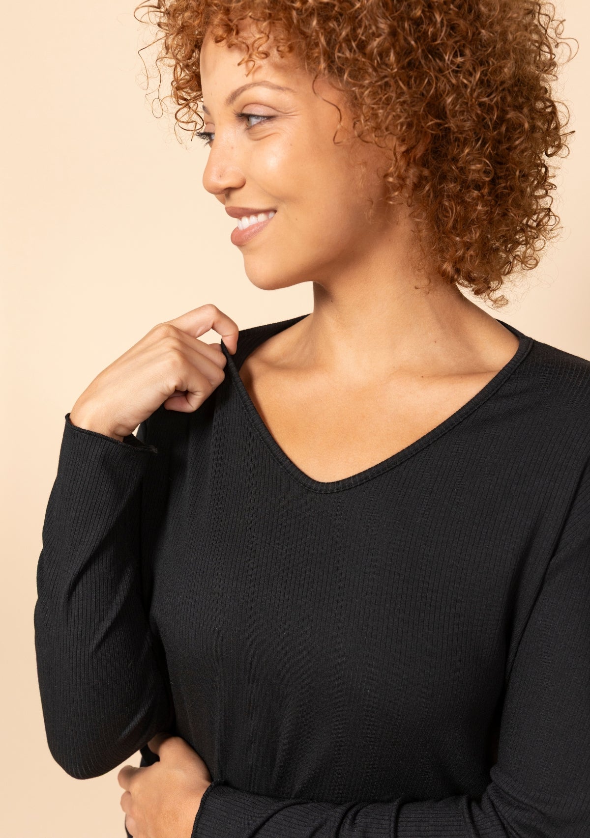 Hedy Modal Ribbed V Neck Long Sleeve Tee in Black, close up view.